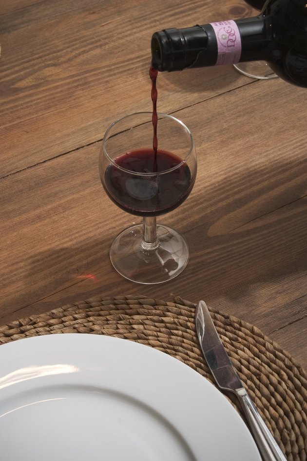 Pouring red wine