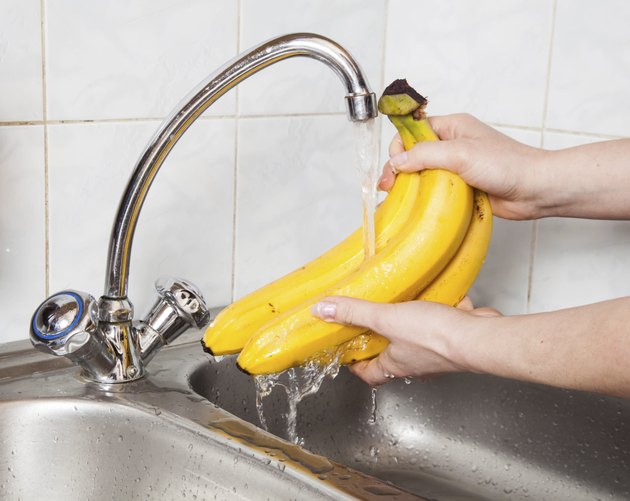 Wash fruits under running water