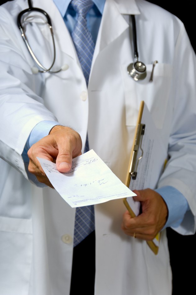 Doctor giving prescription