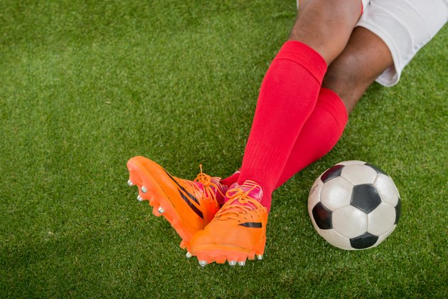 playing soccer with football cleats