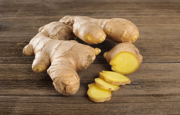 Ginger on the wooden table close up