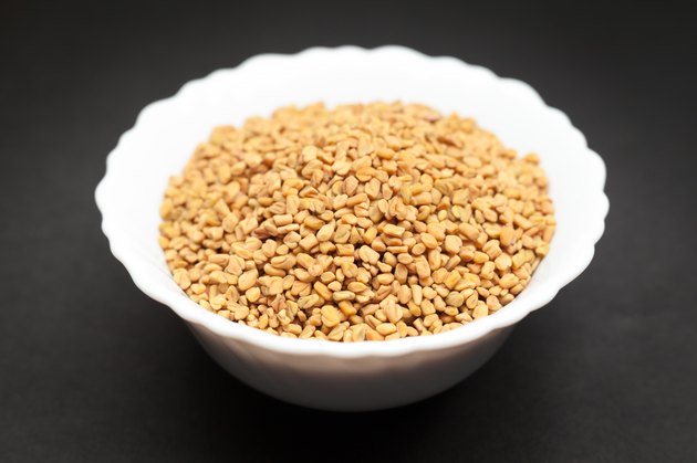 Organic Fenugreek in white bowl.
