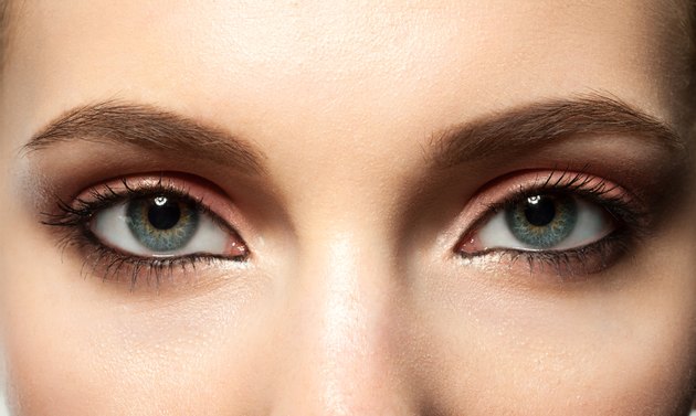 female blue eye with makeup