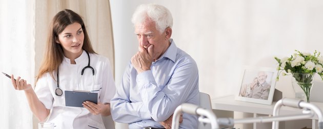 Patient talking with young doctor