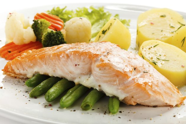 roasted salmon, boiled potatoes and vegetables