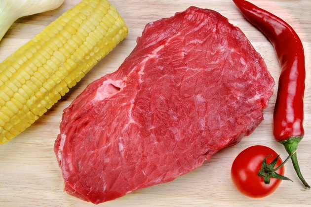Raw Beef Steak And Vegetables Close-Up