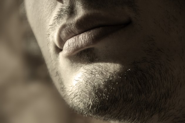 unshaven young man