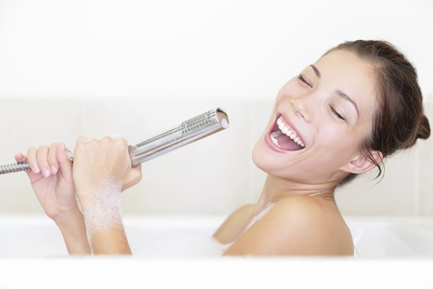 Bath woman singing in bathtub