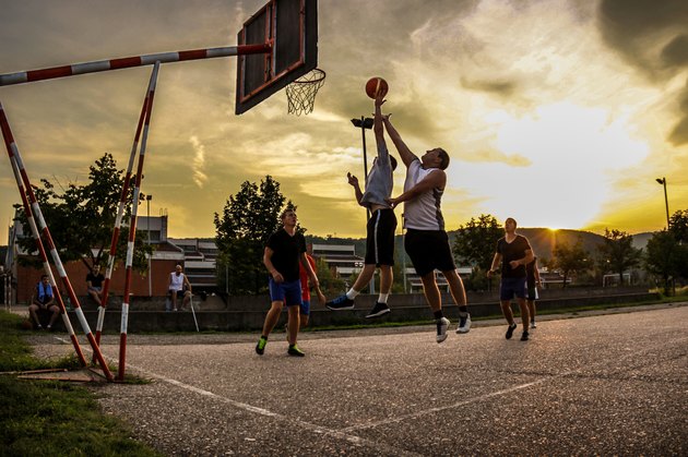 Street basketball at sunset