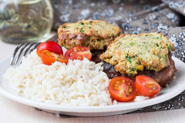 Meat steak, pork fillet fried with golden cheese crust, rice