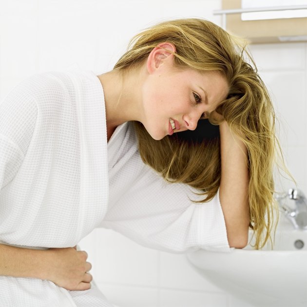 woman with stomach cramps