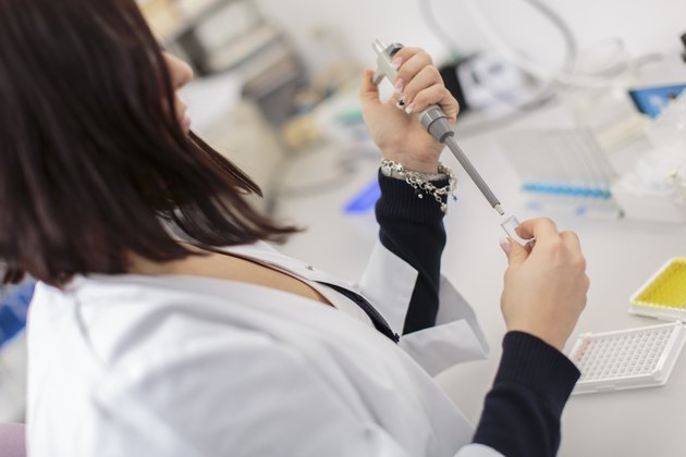 Young woman in the medical laboratory