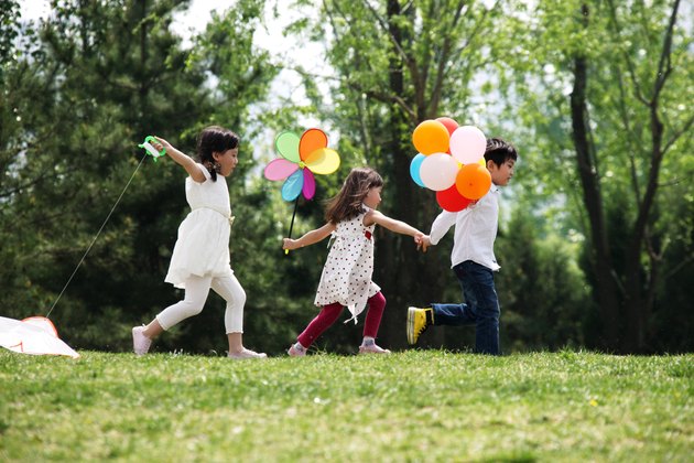 Oriental children playing outdoors