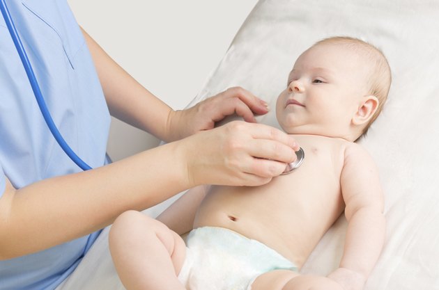 Baby girl with doctor