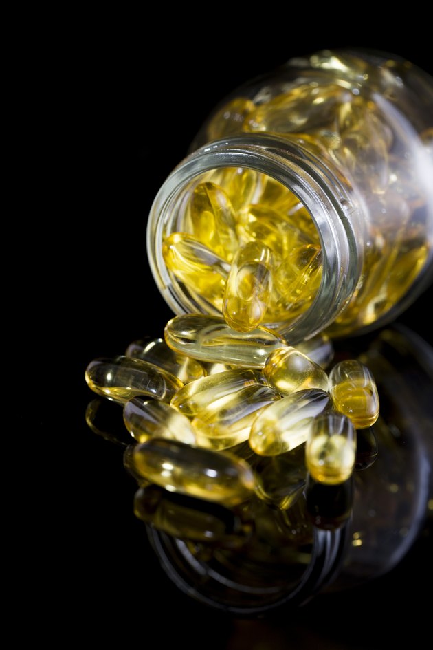 fish oil on black background