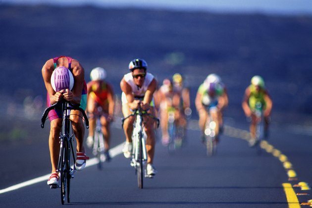 Iron man triathlon cyclists (defocussed)