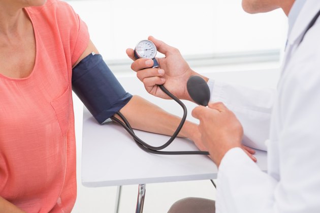 Doctor doing test at his patient