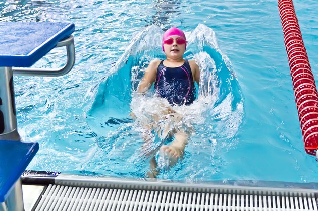 Girl in pink rubber hat