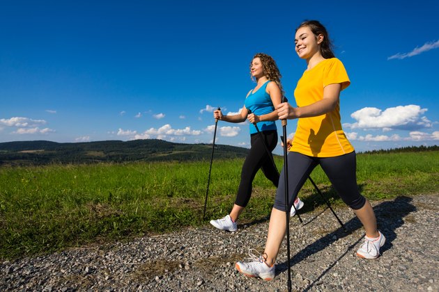 Healthy lifestyle - young women Nordic walking