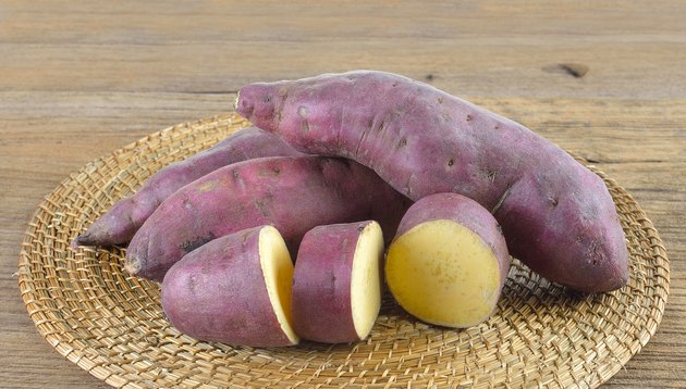 Fresh yam on wooden background