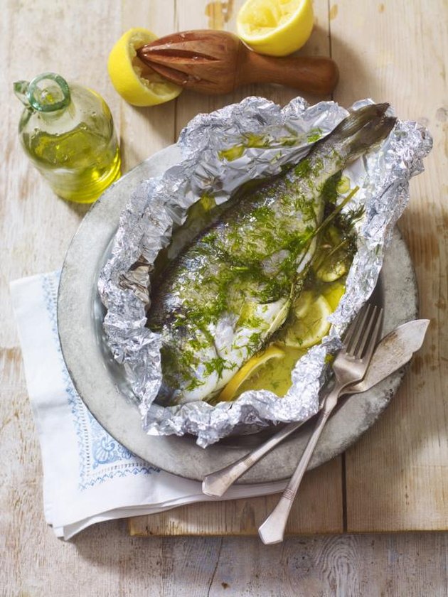 Psari fourni ladolemono, fish baked in foil with lemon, fennel and olive oil