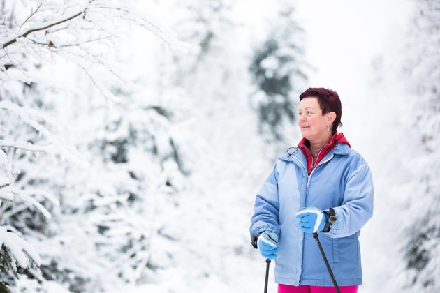 Middle age woman cross-country skiing