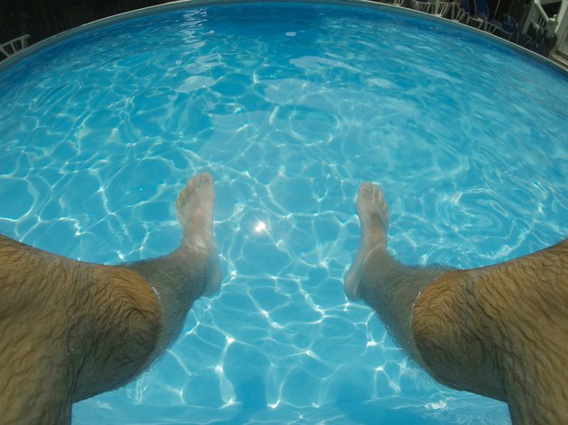 Feet in the swimming pool