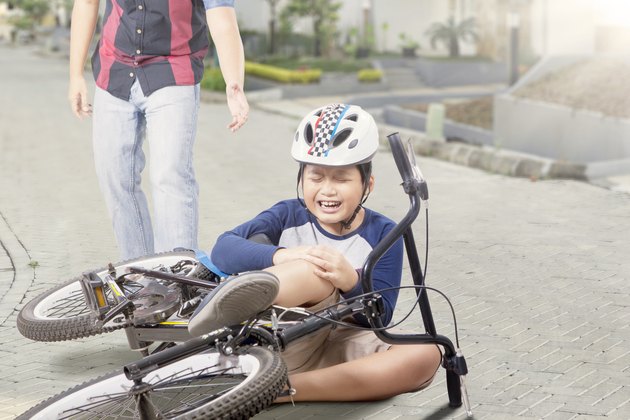 Kid gets accident with his bike and crying