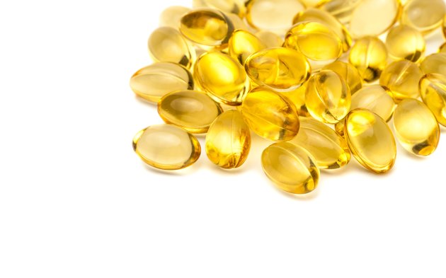 Fish oil capsules isolated on white background