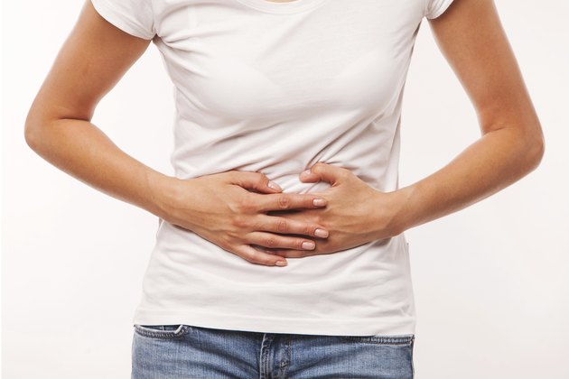 woman is having stomach ache