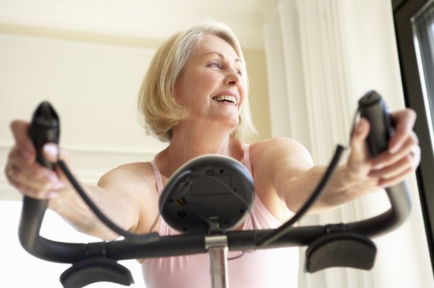 Senior Woman On Exercise Bike