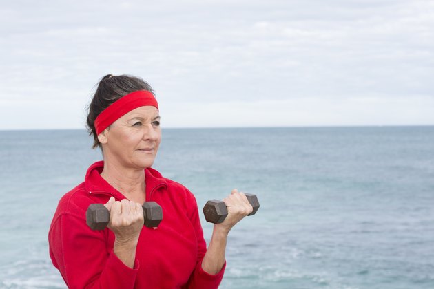 Fit Confident senior woman exercising outdoor