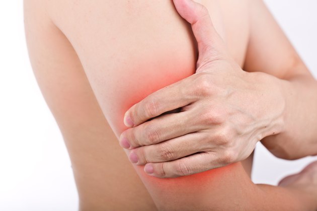 Close up male arm pain isolated white background.