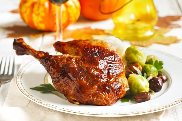 Roasted turkey leg with mash potato, chestnuts and brussels sprouts.