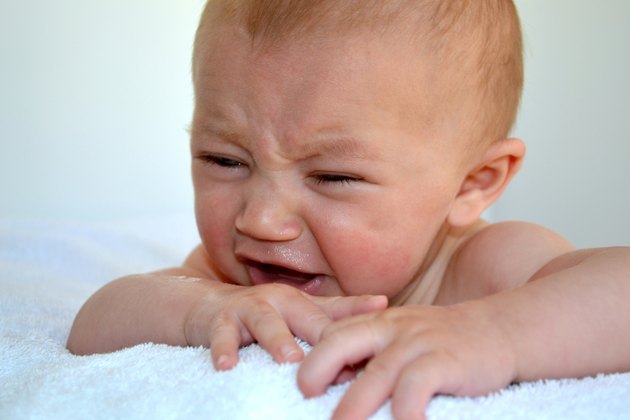 Infant boy showing upset