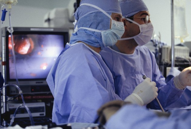 Surgeons operating