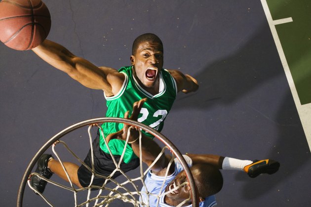 Basketball players playing basketball