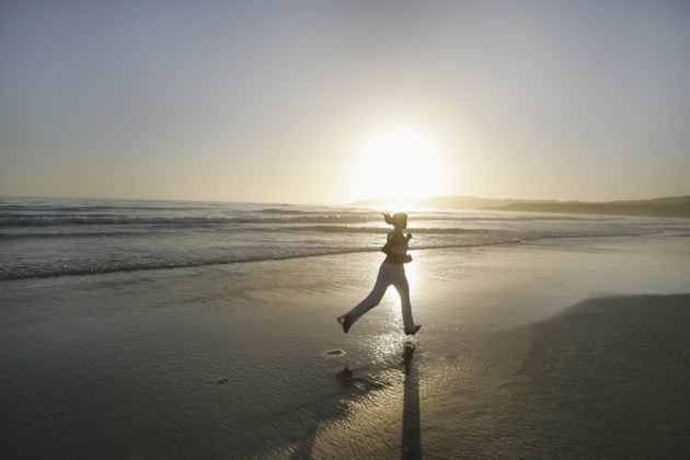 Woman running on beach