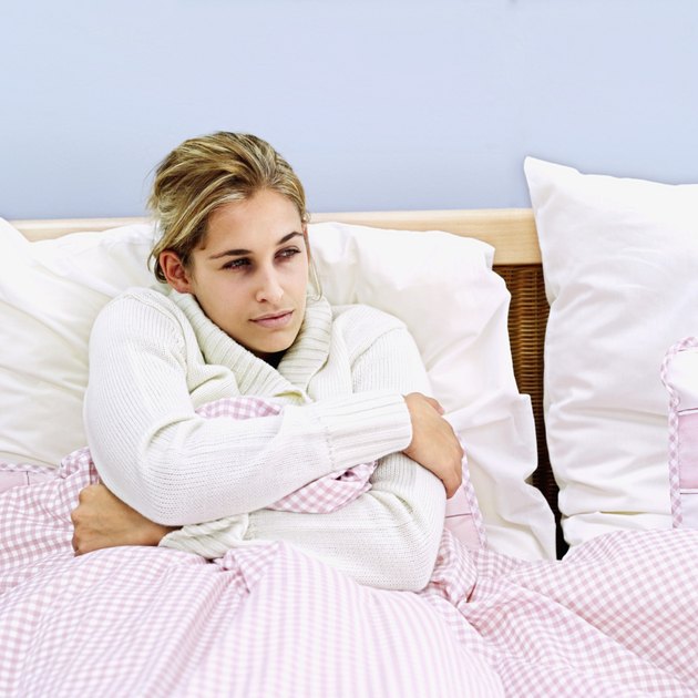 young woman reclining on the bed