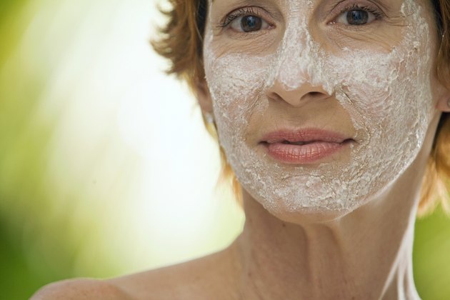 Portrait of a mature woman with a facial mask on