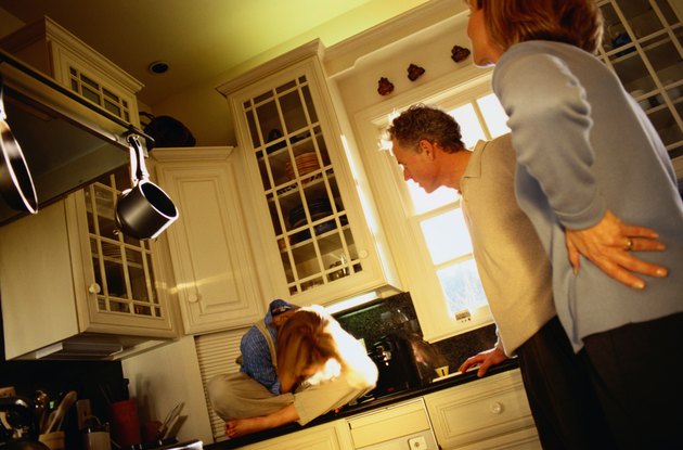 Below View of Parent's Scolding Their Daughter