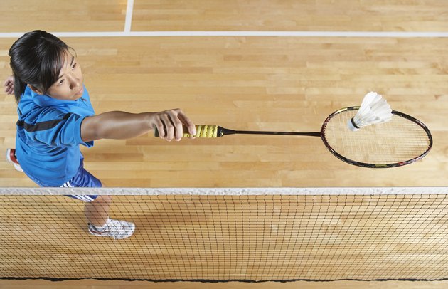 Badminton Player Serving