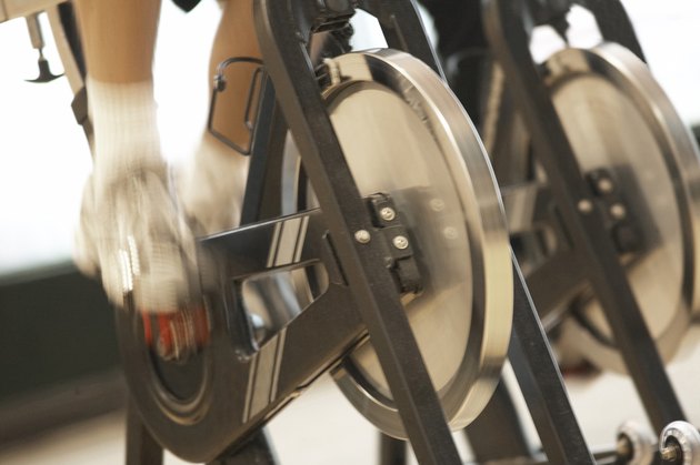 Low section view of a person on an exercise bike