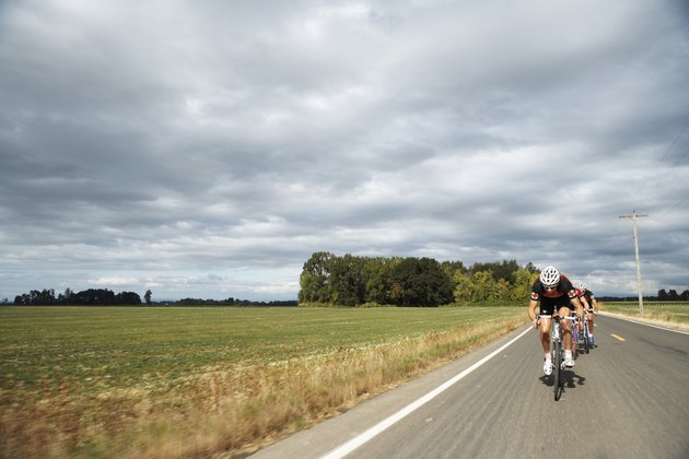 Road cyclists in action, front view