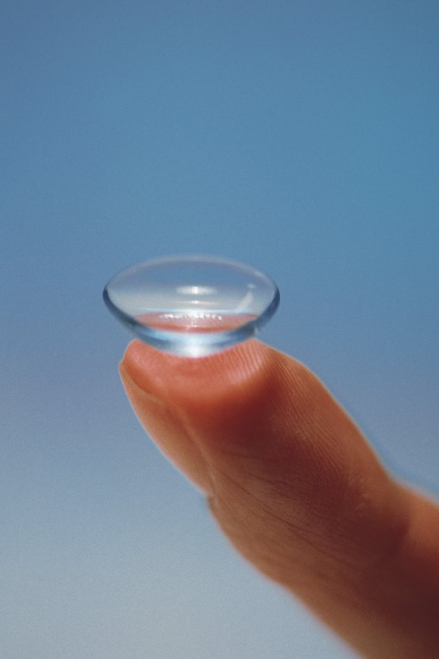 Contact lens on fingertip