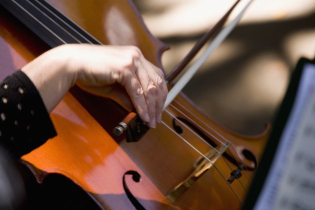 Close-up of a woman playing the cello, Balboa Park, San Diego, California, USA