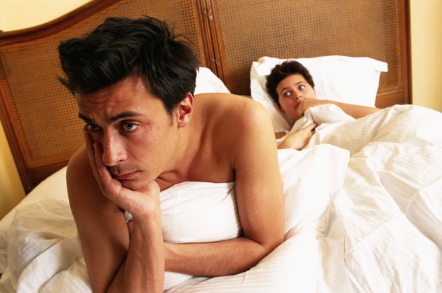 Young couple at bed