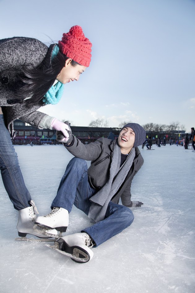 Young couple at ice rink