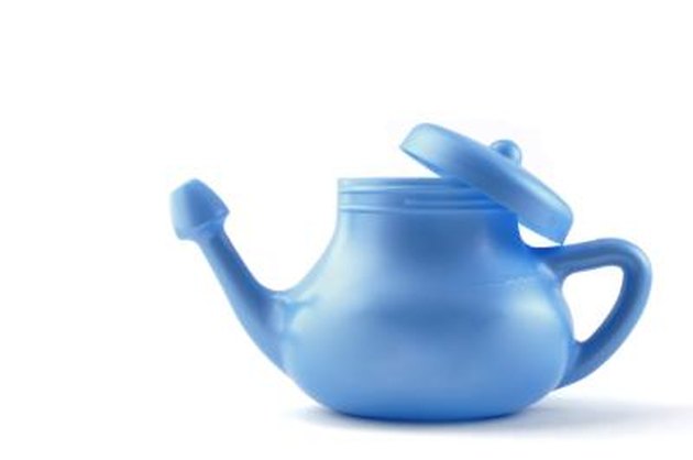 A modern plastic Neti Pot, used for nasal irrigation, a homeopathic remedy for sinus relief. Nasal irrigation has been practiced in India for centuries as one of the disciplines of yoga.
