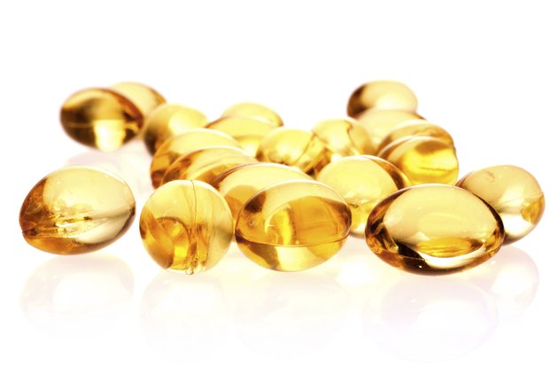 fish oil capsules isolated on white background